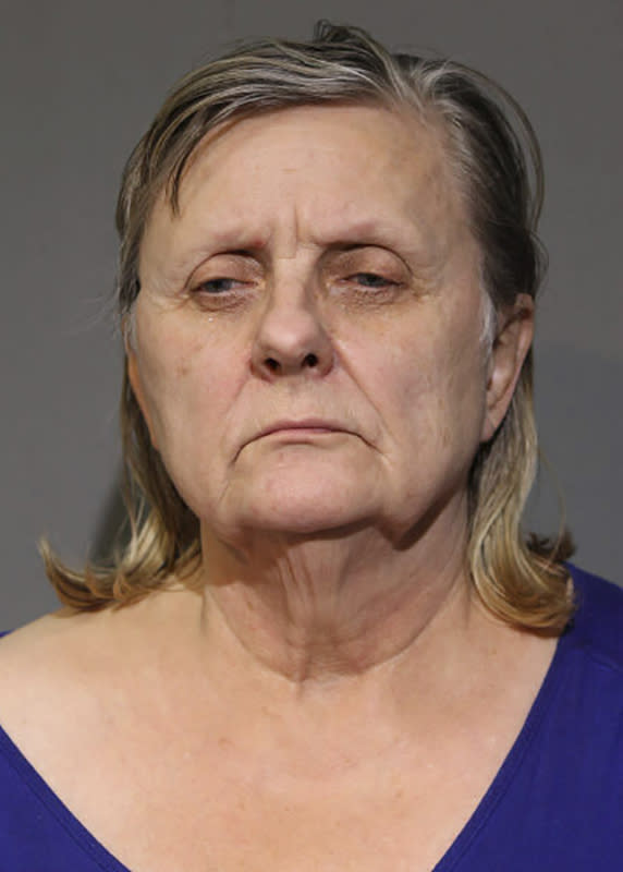 This booking image provided by the Chicago Police Department, shows Eva Bratcher, who has been accused of keeping her mother's dead body in a freezer for nearly two years while living in a nearby apartment. Bratcher appeared in court Thursday, Feb. 2, 2023, on charges of concealing her 96-year-old mother’s death and possessing a fraudulent identification card. (Chicago Police Department via AP)