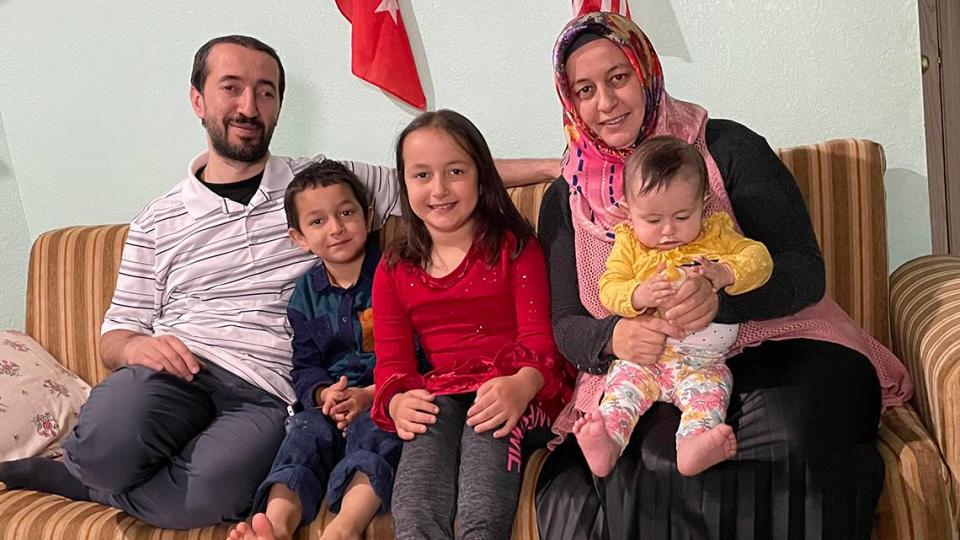 Benjamin and Ayşe Nur Öztekin Murat with their three children, Metin, Betul and Merve.