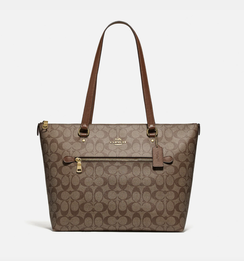 Gallery Tote in brown signature canvas (Photo via Coach Outlet)