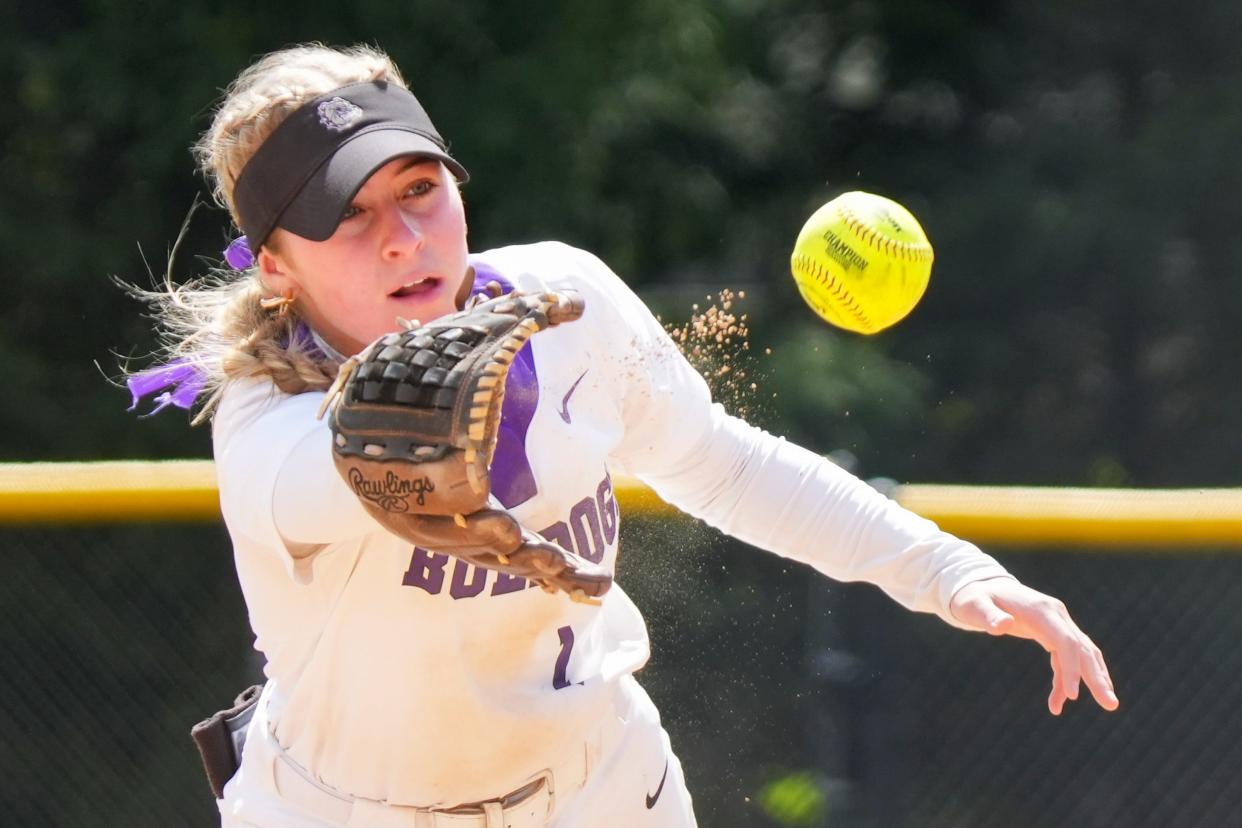 Brownsburg Bulldogs Lexi Gordon (1) flips the ball to the first basemen against the Lake Central Indians during the Carmel Softball Invitational on Saturday, April 20, 2024, at the Cherry Tree Softball Complex in Carmel, Indiana.