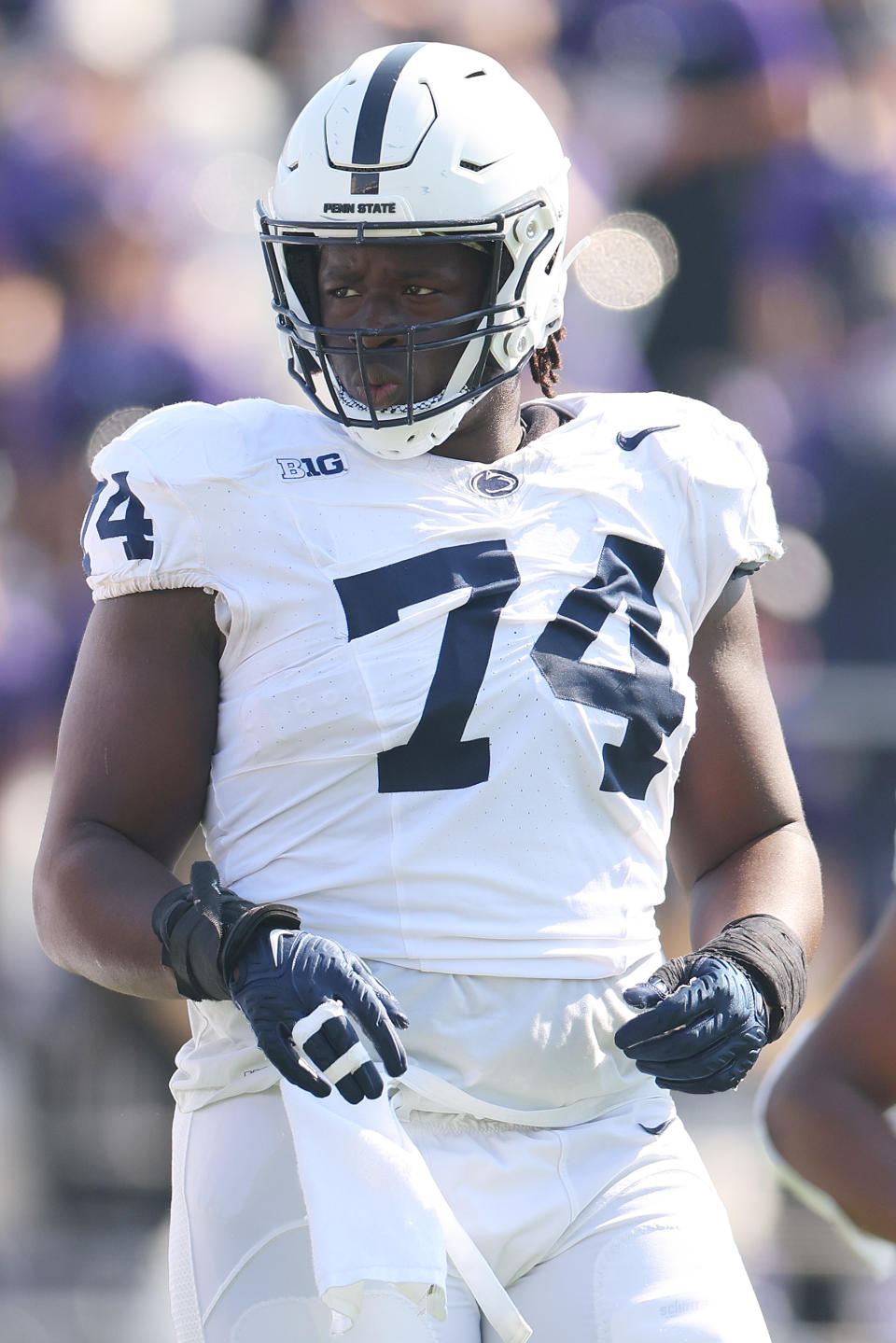 EVANSTON, ILLINOIS – SEPTEMBER 30: Olumuyiwa Fashanu #74 of the Penn State Nittany Lions looks on against the Northwestern Wildcats during the first half at Ryan Field on September 30, 2023 in Evanston, Illinois. (Photo by Michael Reaves/Getty Images)