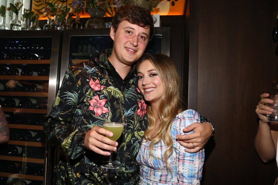 Austen Rydell and Billie Lourd enjoying a fun night at Billie Lourd's Summer Kickoff Party With Mujen Spirits