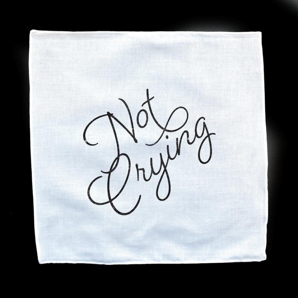 <i>Buy it on <a href="https://fairgoods.com/collections/wedding-handkerchiefs/products/not-crying-white-mandkerchief" target="_blank">Fairgoods</a> for&nbsp;$10.</i>