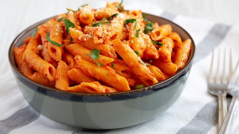 Penne alla vodka in gray bowl