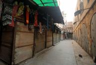 Closed shops are seen at a popular tourist area named "Khan el-Khalili" in the al-Hussein and Al-Azhar districts in Cairo