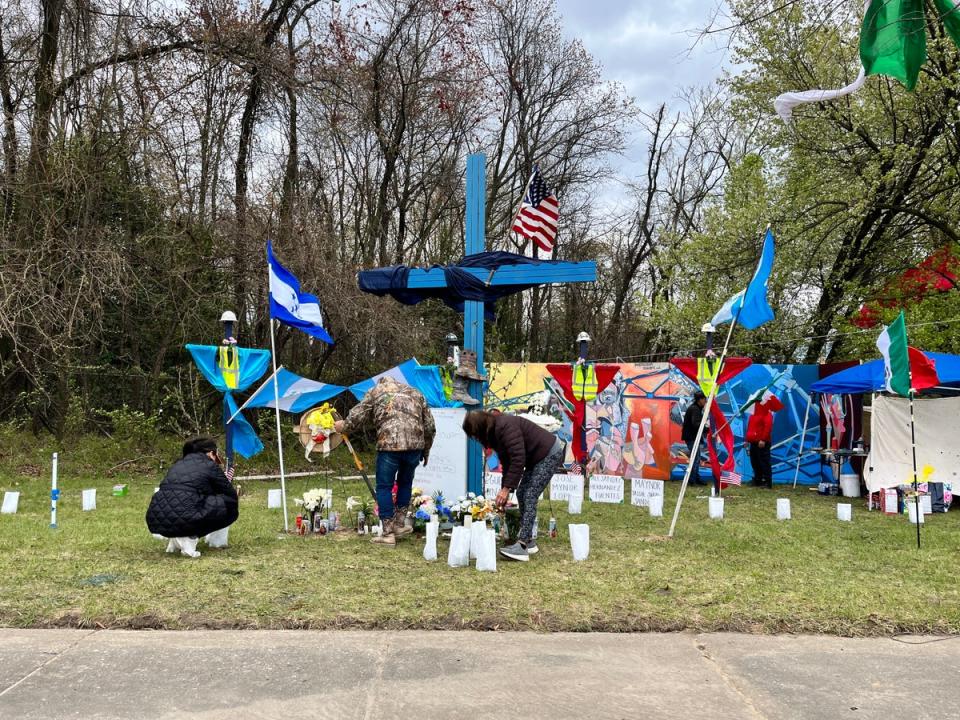 Baltimore locals working on a memorial left for the six victims of the Francis Scott Key Bridge collapse - Maynor Yasir Suazo-Sandoval, 38; Alejandro Hernandez Fuentes, 35; 26-year-old Dorlian Ronial Castillo Cabrera; Jose Mynor Lopez, 35; Miguel Luna, 49, and one who had not been identified (Julia Saqui/The Independent)