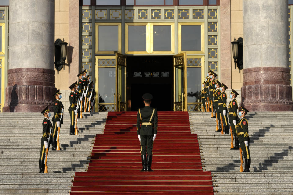 Honor guards stand outside of the Great Hall of the People ahead of the opening ceremony of the Belt and Road Forum, in Beijing, China, Wednesday, Oct. 18 2023. (Suo Takekuma/Pool Photo via AP)