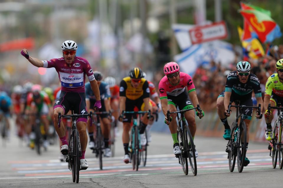 Italian cyclist Elia Viviani crosses the finish line during the third stage of 2018 Giro d’Italia, Tour of Italy cycling race, in the Red Sea city of Eilat, southern Israel, Sunday, May 6, 2018. (AP Photo/Ariel Schalit)