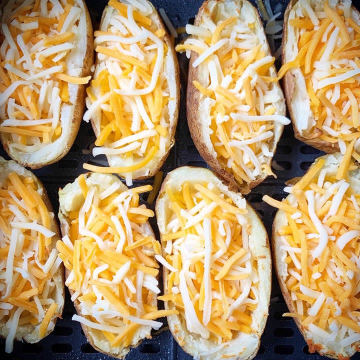 Potato skins stuffed with cheese.