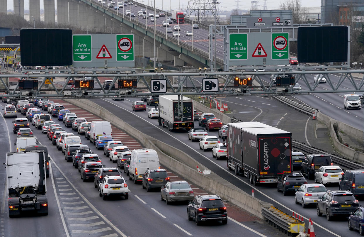 Traffic on the M25 in Dartford, Kent. The first Christmas getaway for two years has led to high demand for leisure journeys by road, rail and air. A survey of nearly 2,000 people in Britain for watchdog Transport Focus indicated that 44% plan to travel to visit friends or family over the festive period. Picture date: Friday December 24, 2021.