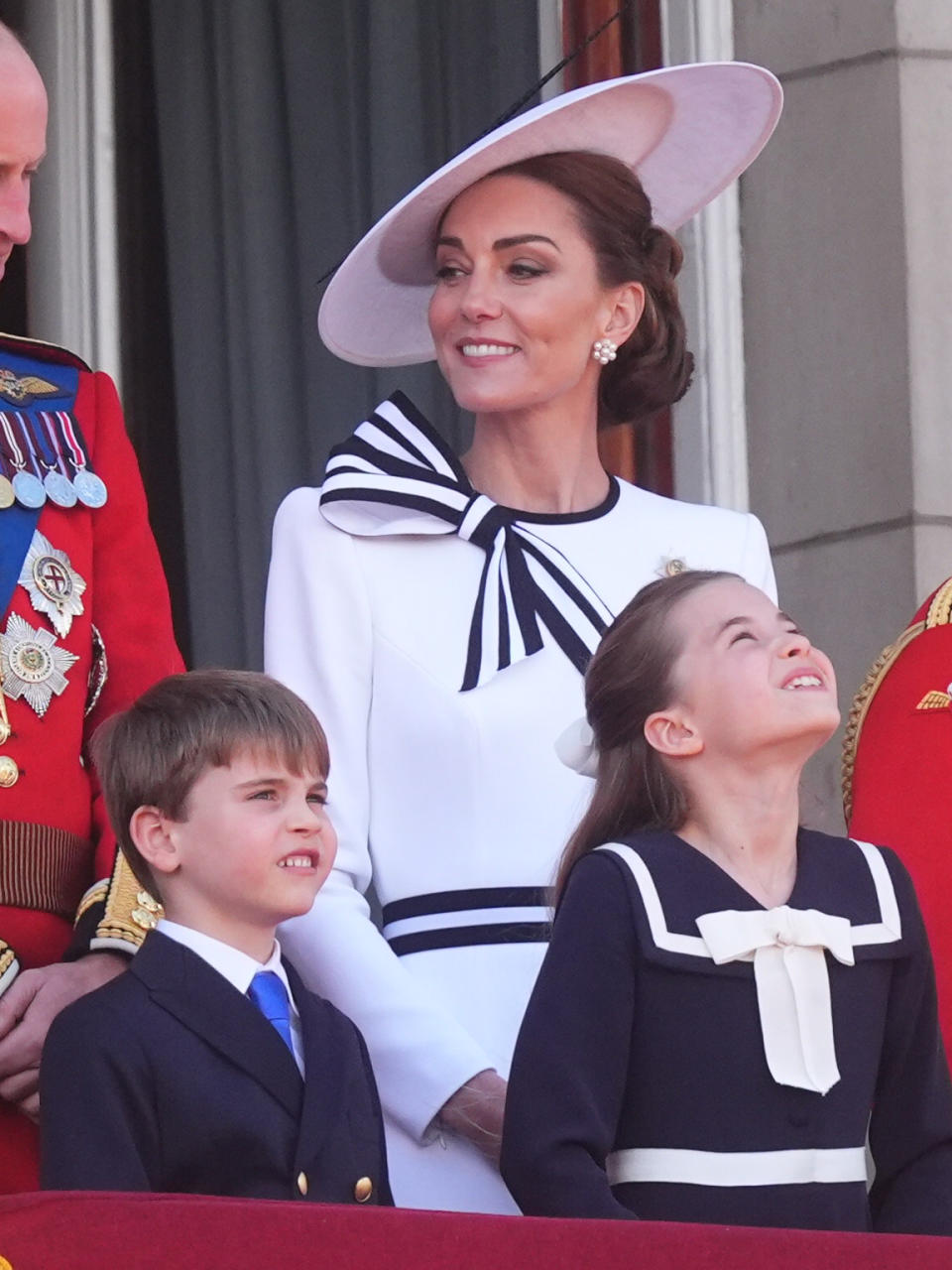 Prince Louis, the Princess of Wales and Princess Charlotte on the balcony of Buckingham Palace, London, to view the flypast following the Trooping the Colour ceremony in central London, as King Charles celebrates his official birthday. Picture date: Saturday June 15, 2024. (Photo by James Manning/PA Images via Getty Images)