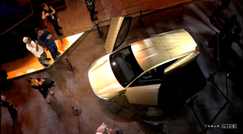 Tesla's robotaxi is displayed at an unveiling event in Los Angeles, California, U.S. October 10, 2024,  in this still image taken from a video. Tesla/Handout via REUTERS