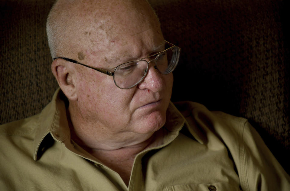 Donn Edmunds, a 25-year U.S. Army veteran who served in Vietnam, sits in his living room in Cheyenne, Wyo., Wednesday, Sept. 1, 2021. Edmunds' son, Army Ranger Spc. Jonn Edmunds, and another soldier died when a Black Hawk helicopter on a search-and-rescue mission crashed in Pakistan in October 2001. They were among the first U.S. casualties in the Afghanistan war. (AP Photo/Thomas Peipert)