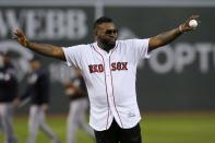 Former Boston Red Sox's David Ortiz gets ready to throw out a ceremonial first pitch before a baseball game against the New York Yankees in Boston, Monday, Sept. 9, 2019. (AP Photo/Michael Dwyer)