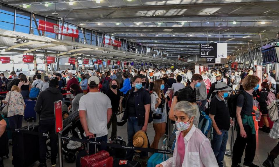 Queues of people are seen at the Virgin and Jetstar departure terminal at Sydney Domestic Airport in Sydney, Thursday, April 14, 2022. Airports around the country are expecting the busiest day in two years as hundreds of thousands of travellers prepare to fly out for the Easter long weekend. (AAP Image/Bianca De Marchi) NO ARCHIVING