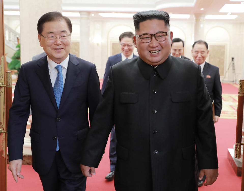 In this Wednesday, Sept. 5, 2018 photo provided on Thursday, Sept. 6, 2018 by South Korea Presidential Blue House via Yonhap News Agency, North Korean leader Kim Jong Un, right, meets with South Korean National Security Director Chung Eui-yong in Pyongyang, North Korea. A South Korean delegation met with North Korean leader Kim Jong Un on Wednesday during a visit to arrange an inter-Korean summit planned for this month and help rescue faltering nuclear diplomacy between Washington and Pyongyang. (South Korea Presidential Blue House/Yonhap via AP)