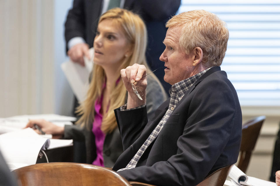 Alex Murdaugh sits with his legal team as jury selection continues before his trial at the Colleton County Courthouse in Walterboro, S.C., Tuesday, Jan. 24, 2023. Murdaugh, 54, faces 30 years to life in prison if convicted of murder in the deaths of his wife Maggie, 52, and their son, Paul, 22. (Joshua Boucher/The State via AP, Pool)