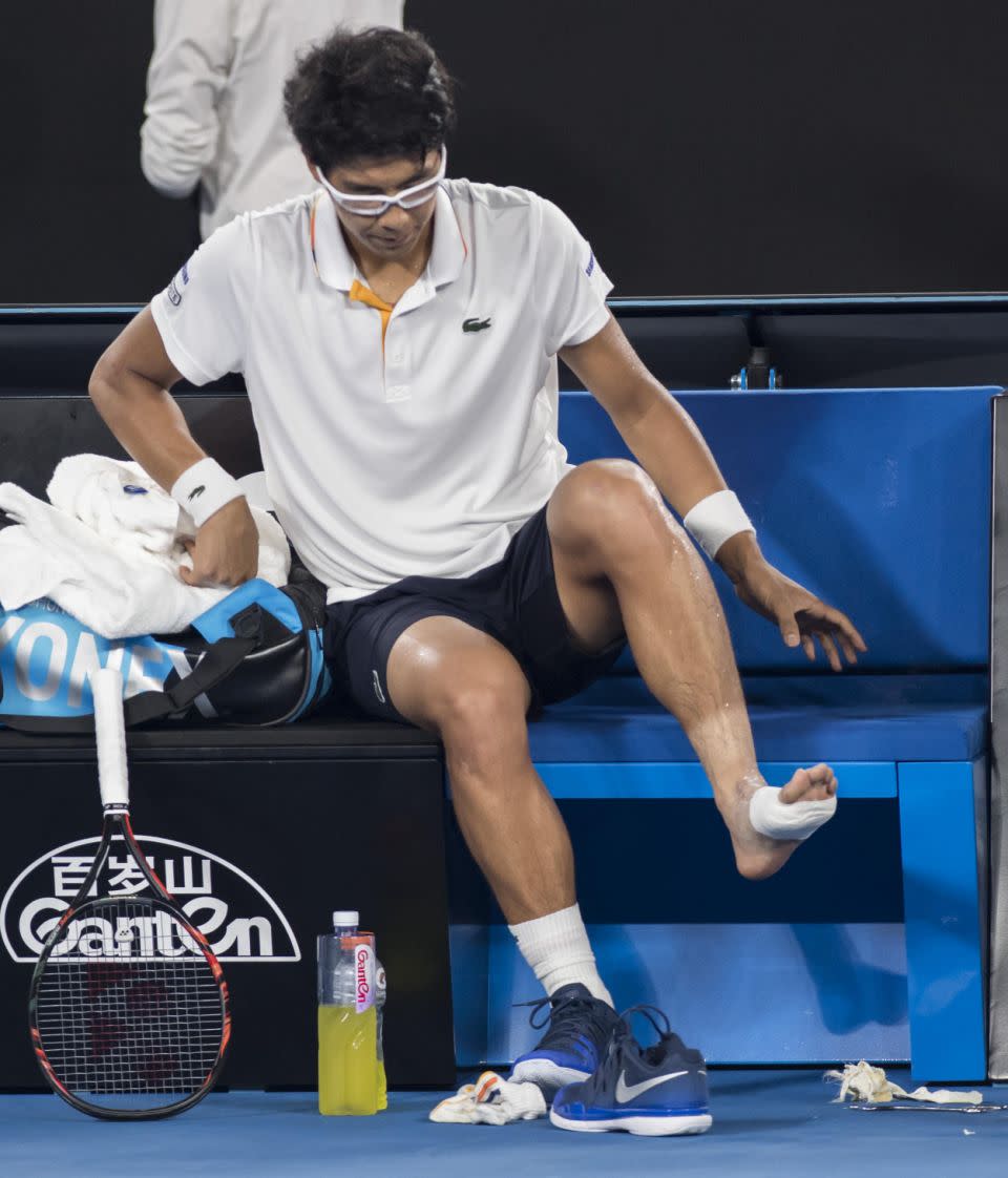 Chung receives treatment on his troubled foot. Pic: Getty