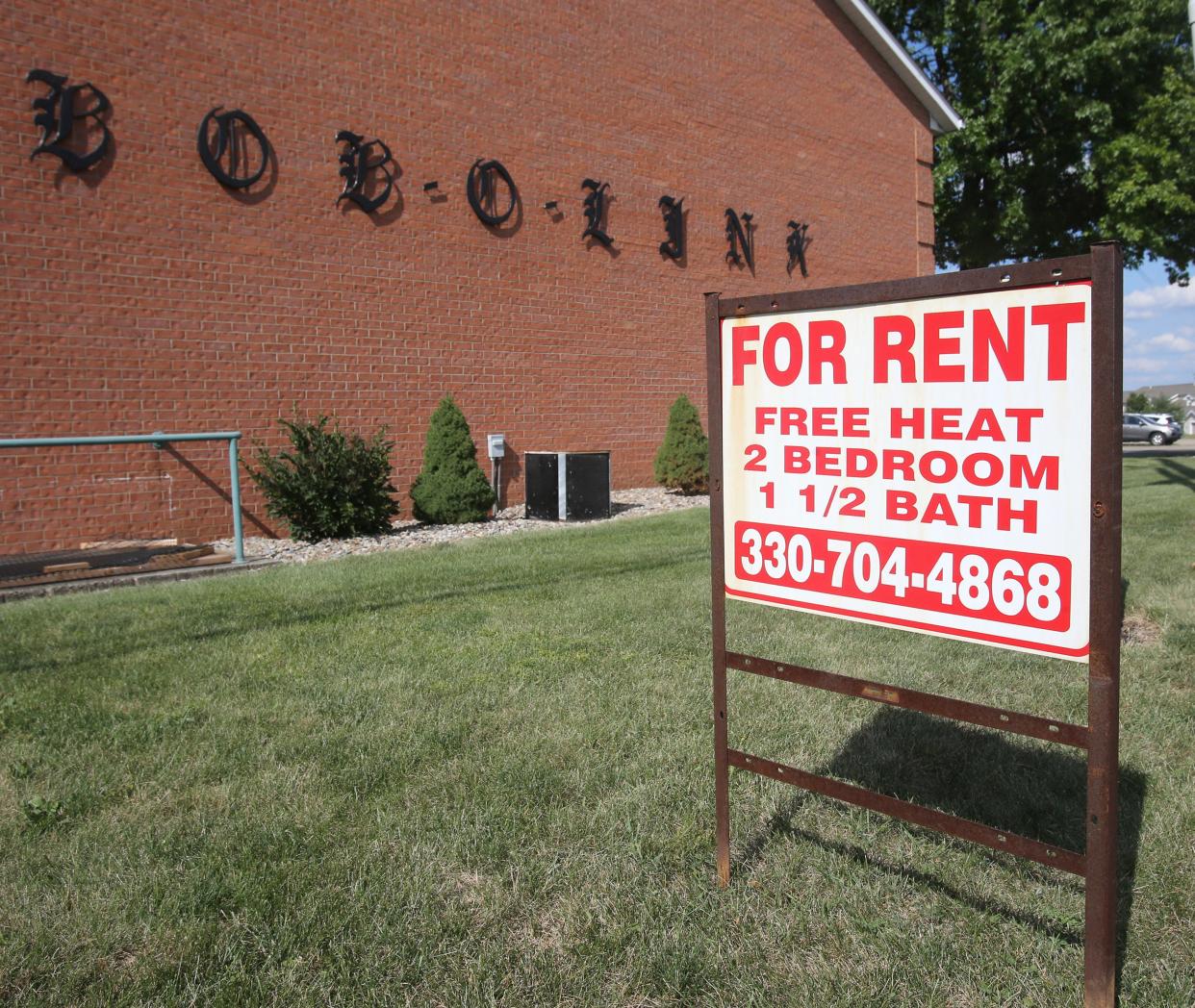 A "For rent" sign is displayed outside of a building in North Canton. The city is moving forward with a rental registration program.