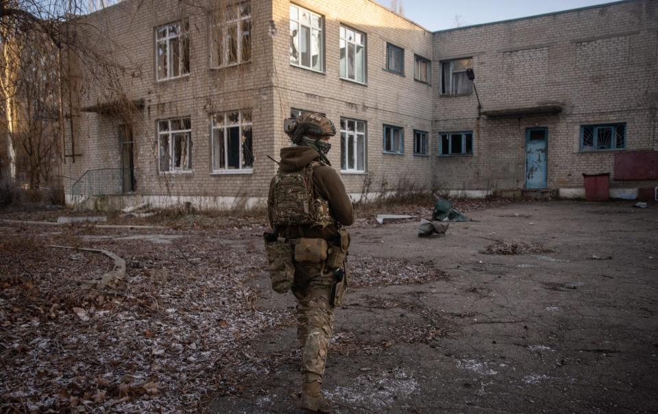 A member of the Ukrainian 110 Separate Mechanised Brigade during a patrol in Avdiivka - Chris McGrath/Getty Images