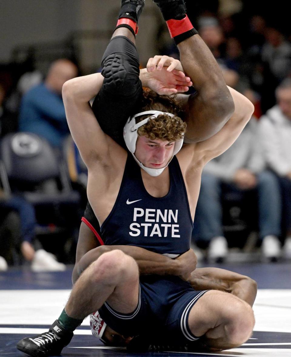 Penn State’s Mitchell Mesenbrink wrestles Indiana’s Tyler Lillard in the165 lb bout of the match on Sunday, Jan. 14, 2024 at Rec Hall.