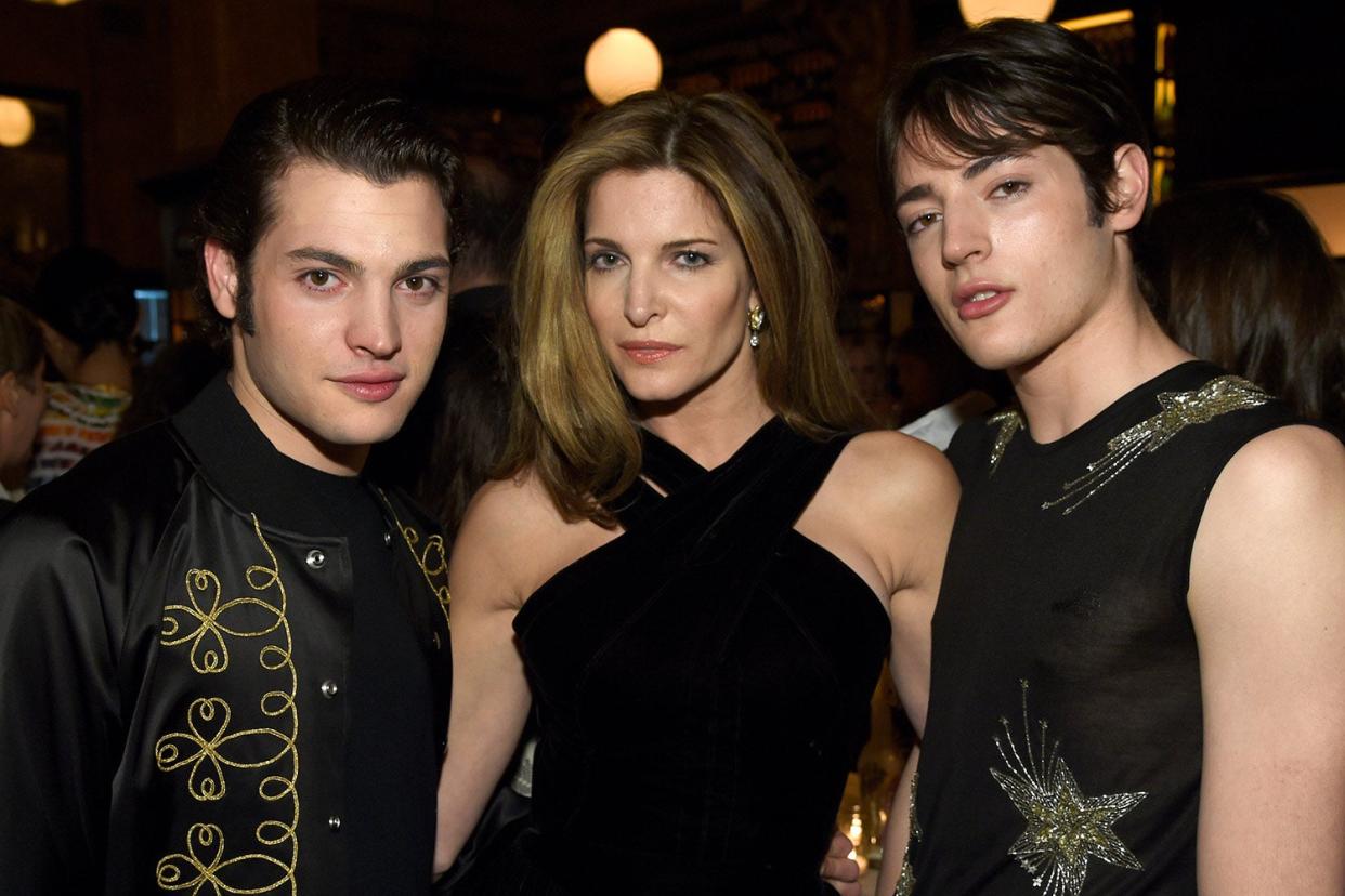 <p>Harry, right, with mother Stephanie Seymour, centre, and brother Peter Brant, left </p> (Getty Images)