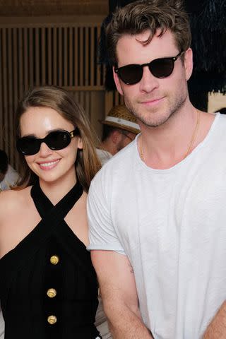 <p>Darren Gerrish/Getty</p> Liam Hemsworth and Gabriella Brooks attend the Balmain Brunch & Pool Party hosted by Olivier Rousteing, Creative Director of Balmain, to unveil the special summer collaboration during the One&Only Aesthesis Grand Opening Party, on June 08, 2024 in Athens, Greece