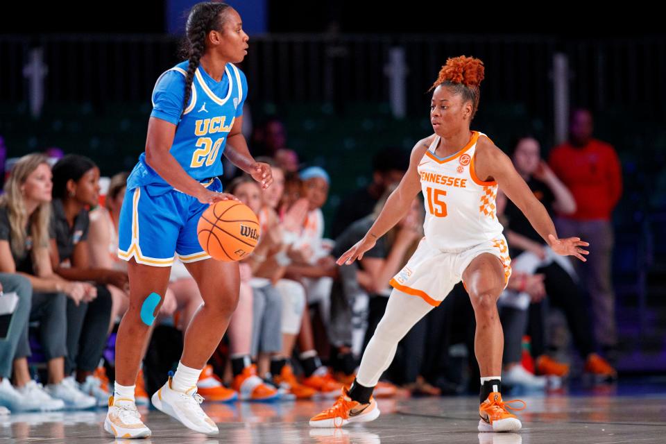 PARADISE ISLAND, BS - November 20, 2022 - Guard Jasmine Powell #15 guards Charisma Osborne during the Battle 4 Atlantis game between the UCLA Bruins and the Tennessee Lady Volunteers at Imperial Arena in Paradise Island, Bahamas.