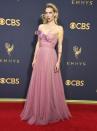 <p>Kirby stepped out for the Emmys in an elegant pink strapless Marchesa gown. She finished the look with a dark lip.</p>