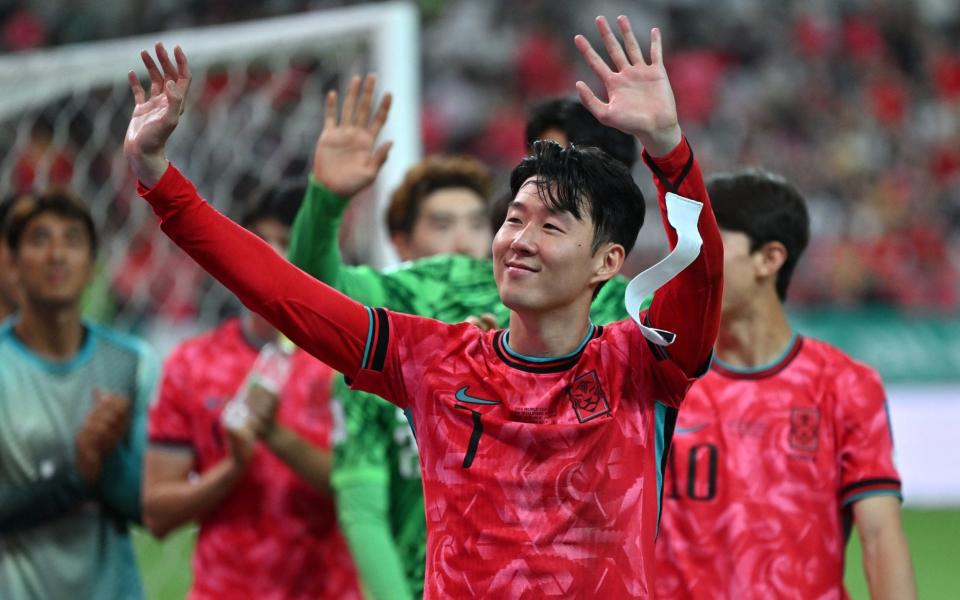 South Korea's Son Heung-min waves to fans after his team's win in the World Cup qualifier against China in Seoul on June 11, 2024