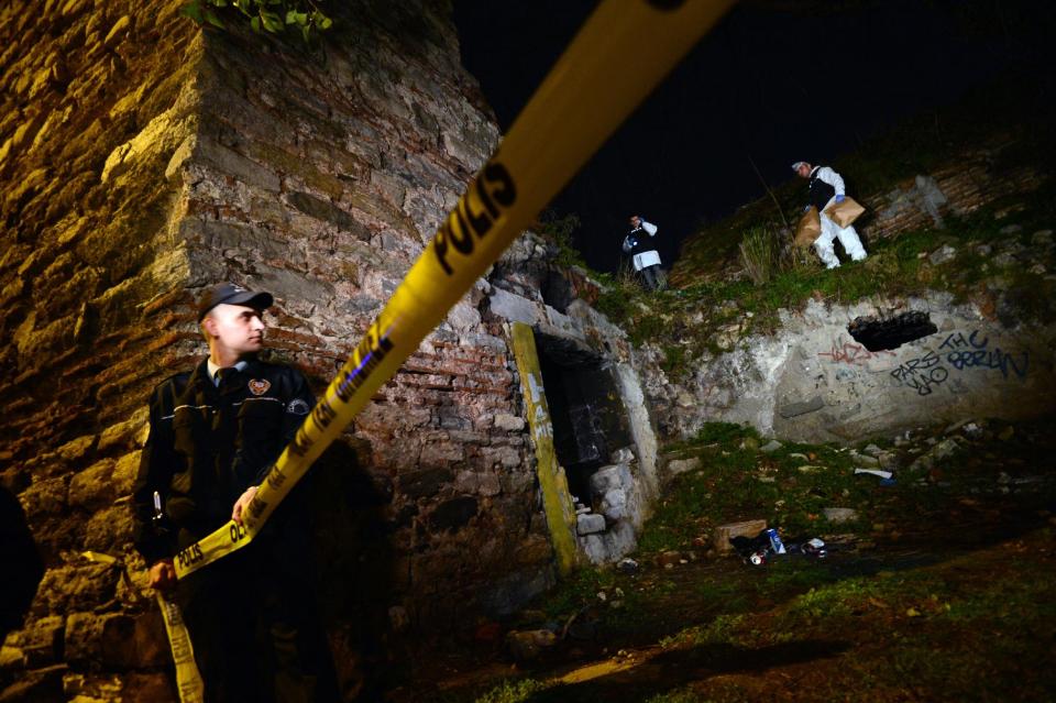 FILE - This Feb. 2, 2013 file photo shows police forensics workers searching for Sarai Sierra, a missing New York City woman, near the remnants of some ancient city walls in low-income district of Sarayburnu in Istanbul, Turkey. Sierra, a 33-year-old mother of two, went missing while vacationing alone in Istanbul. Her body was discovered Feb. 2 amid the city walls. Recent high-profile attacks on tourists in India, Brazil, Turkey and Mexico have raised questions about personal safety for overseas travel, especially for women. But frequent travelers and those who work in the industry say a few common-sense precautions can go a long way to ensuring personal safety. (AP Photo, file)