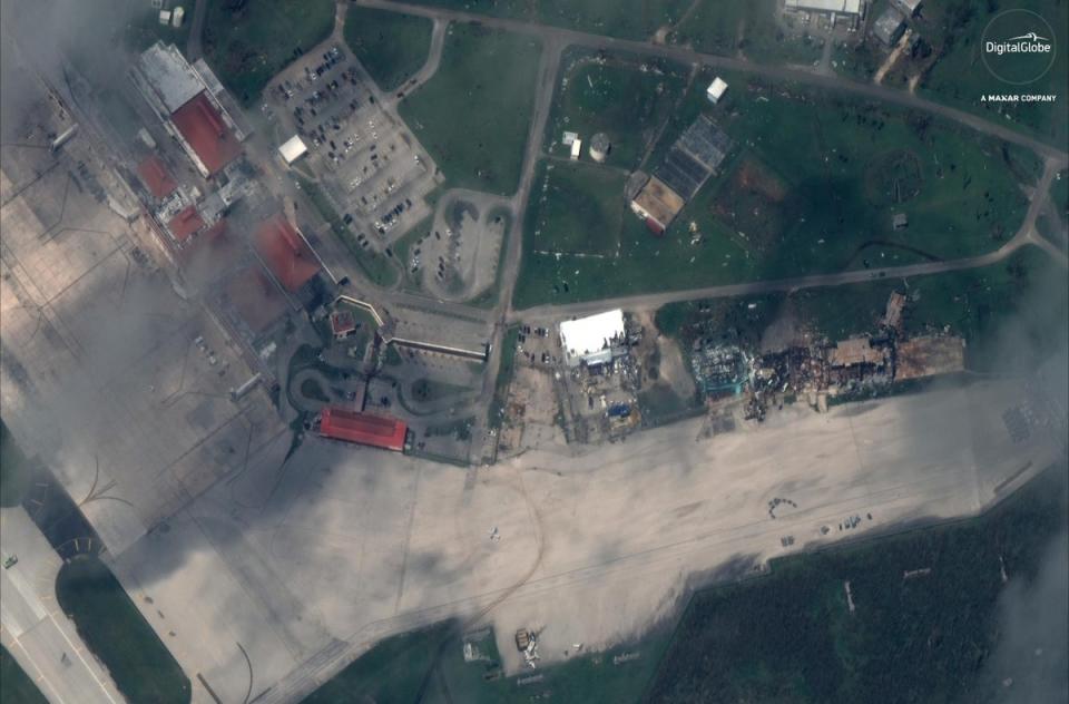 This October 26, 2018, satellite image provided by DigitalGlobe shows Saipan International Airport on Saipan, an island of the Northern Mariana Islands, after Super Typhoon Yutu (AP)