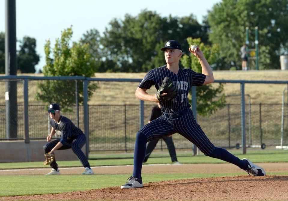Central Catholic starting pitcher TP Wentworth delivers a pitch in the first inning of the Sac-Joaquin Section Division III Championship game at Islander’s Park in Lathrop on Thursday, May 25, 2023. Central Catholic won the game 3-2 in extra innings.