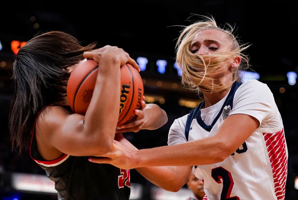 Bedford North Lawrence Chloe Spreen (2) reaches for the ball during the IHSAA Class 3A girls basketball state finals championship game Saturday, Feb. 25, 2023 at Gainbridge Fieldhouse in Indianapolis. The Bedford North Stars defeated the Fishers Tigers, 46-42. 