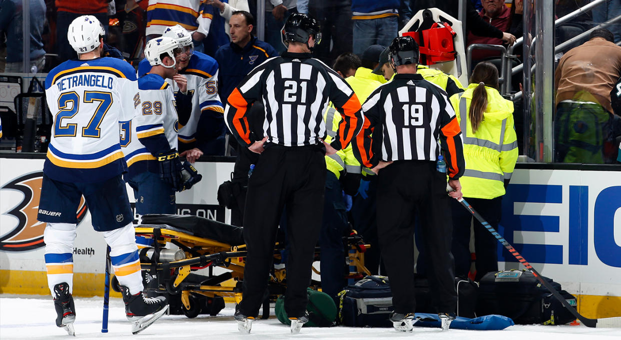 ANAHEIM, CA - FEBRUARY 11: The St. Louis Blues watch as the paramedics tend to Jay Bouwmeester #19 of the St. Louis Blues after he collapsed on the bench during the first period of the game against the Anaheim Ducks at Honda Center on February 11, 2020 in Anaheim, California. (Photo by Debora Robinson/NHLI via Getty Images) 