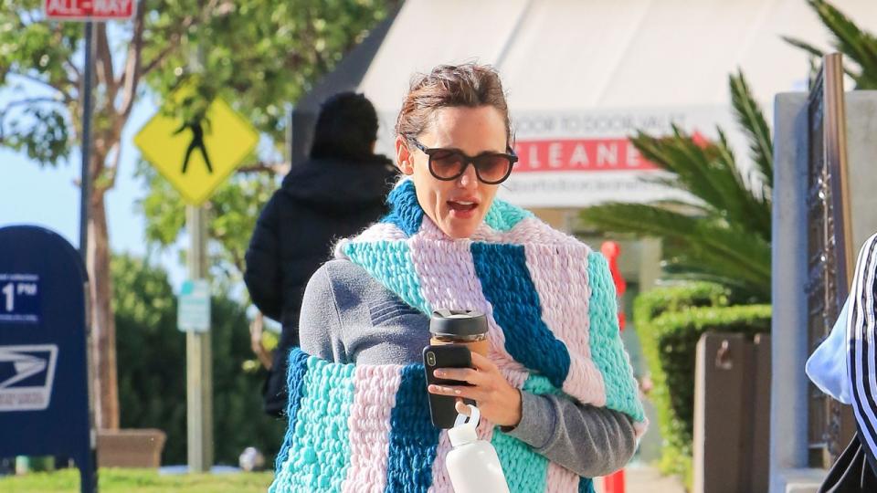 The 46-year-old actress stays cozy in a multi-colored scarf while out in Los Angeles.