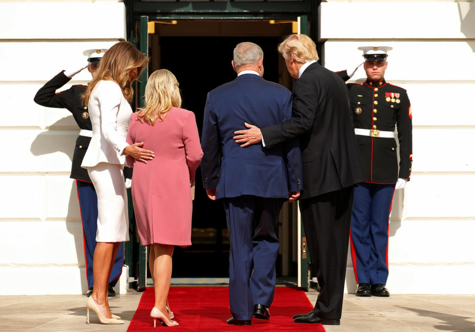 U.S. President Donald Trump (R) and first lady Melania Trump (L) greet Israeli Prime Minister Benjamin Netanyahu and his wife Sara as they arrive at the South Portico of the White House in Washington on February 15, 2017.&nbsp;