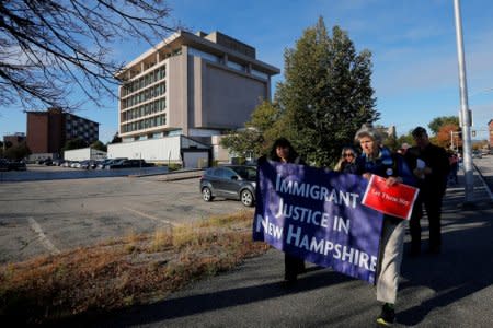 FILE PHOTO: Demonstrators hold an