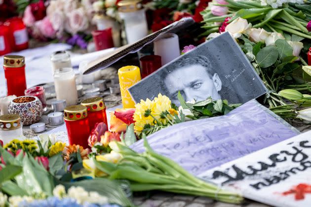 17 February 2024, Berlin: People pay tribute to opposition politician Alexei Navalny with flowers and pictures in front of the Russian embassy in Berlin. Photo: Fabian Sommer/dpa (Photo by Fabian Sommer/picture alliance via Getty Images)