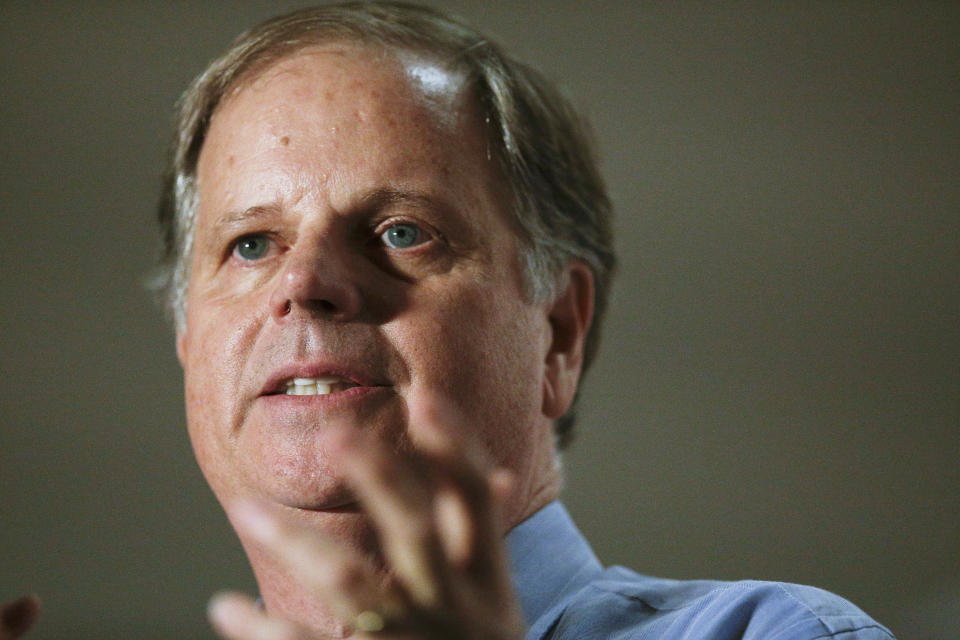 FILE - In this Tuesday, Oct. 3, 2017, file photo, Democrat Doug Jones speaks at a campaign rally for the race to fill Attorney General Jeff Sessions' former Senate seat, in Birmingham, Ala. President Donald Trump in tweets Sunday, Nov. 26, is again coming to the side of Republican Roy Moore by bashing Jones in the Alabama Senate race. (AP Photo/Brynn Anderson, File)