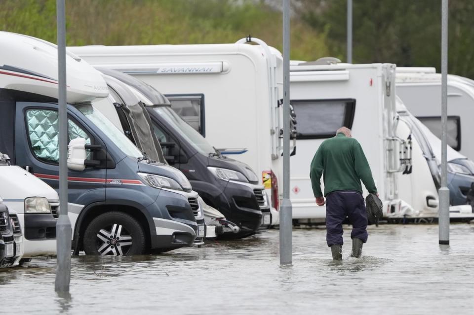 Flooding near a caravan self-storage site near Rope Walk in Littlehampton (PA)