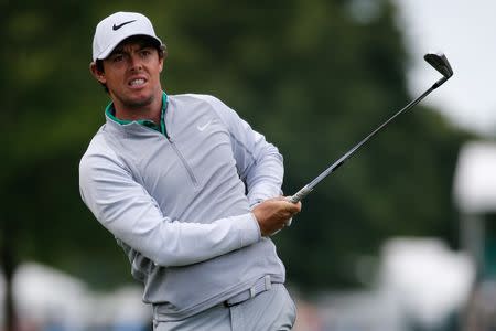 May 6, 2016; Charlotte, NC, USA; Rory McIlroy of Northern Ireland watches his ball travel towards the green on number 10 during the second round of the 2016 Wells Fargo Championship at Quail Hollow Club. Mandatory Credit: Jim Dedmon-USA TODAY Sports