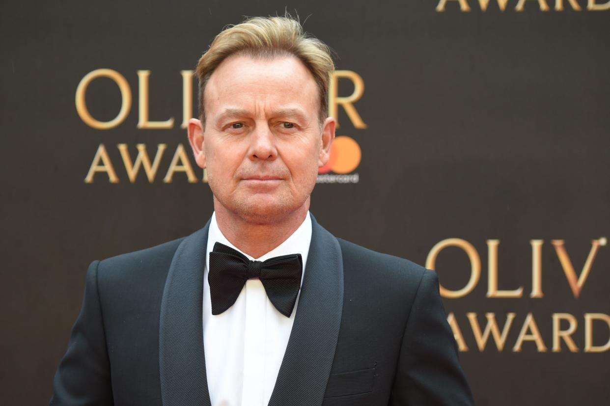 Jason Donovan poses on the red carpet upon arrival to attend The Olivier Awards at the Royal Albert Hall in central London on April 8, 2018. / AFP PHOTO / Anthony HARVEY / Getty Images)