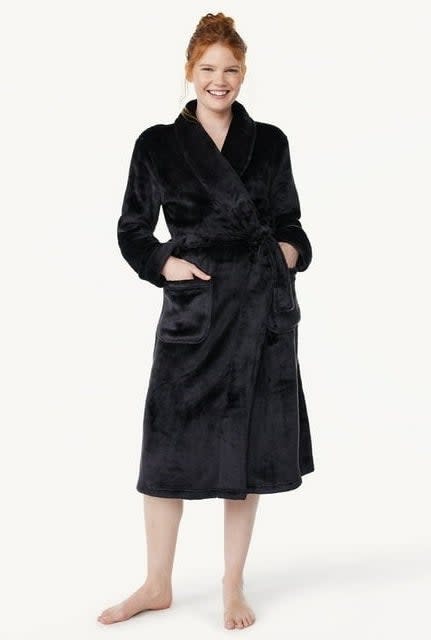 model wearing a black robe