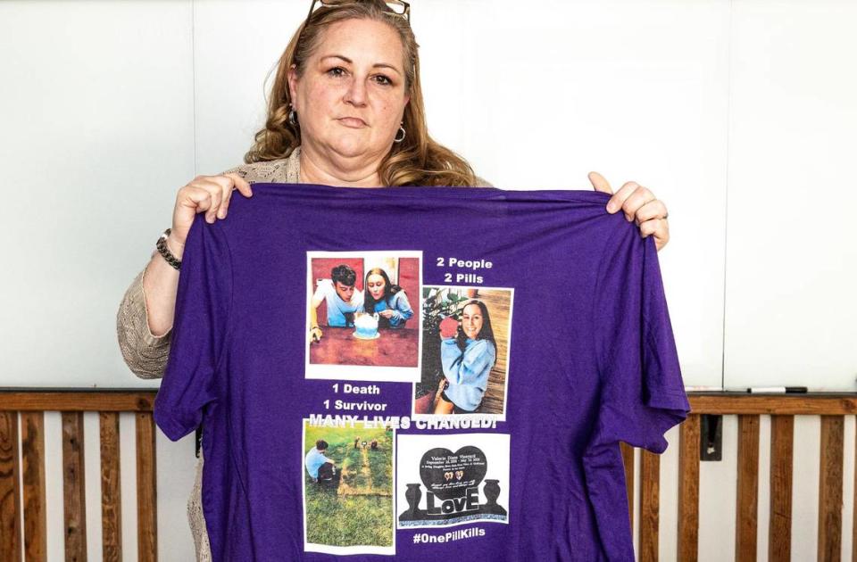 Andrea McCutcheon holds a shirt made in memory of her daughter Valerie Vineyard, who died from a fentanyl overdose on May 27, 2021, at the age of 19.