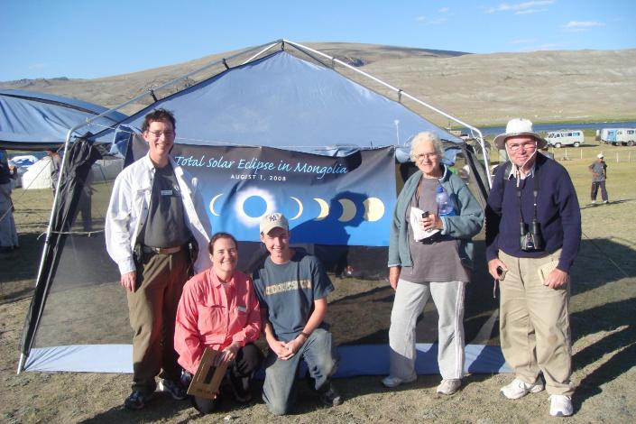 This 2008 photo supplied by Linda Bugbee shows, from left, her husband George, herself, and Dali and Eli Maor, in Mongolia where they had traveled to watch a solar eclipse. The Bugbees are traveling to watch their fourth solar eclipse on Nov. 14 in Cairns, Australia, where some 50,000 tourists are expected to see the phenomenon. (AP Photo/courtesy of Linda Bugbee)
