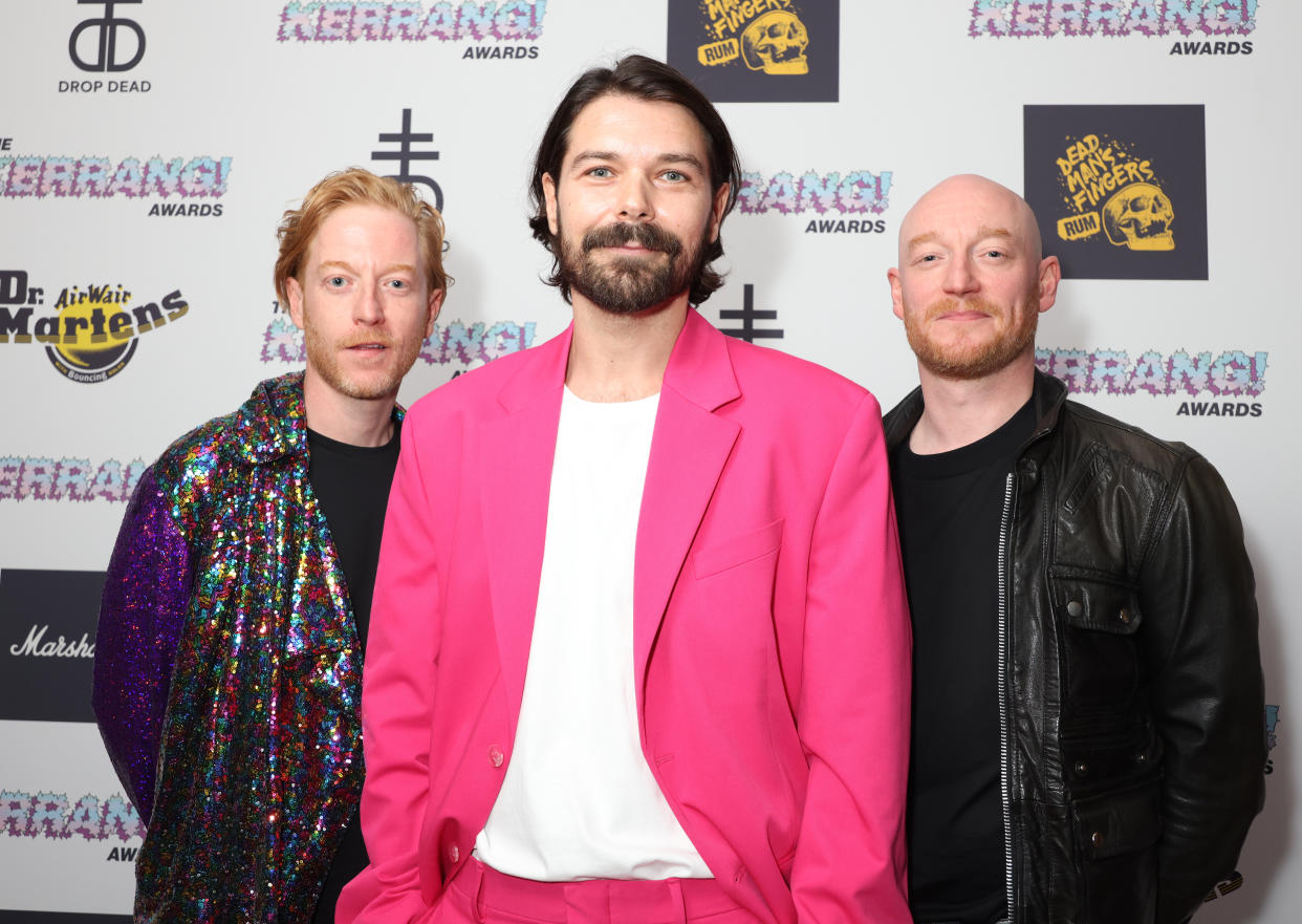 Simon Neil, centre, with his Biffy Clyro bandmates James Johnston, left, and Ben Johnston (Suzan Moore/PA)