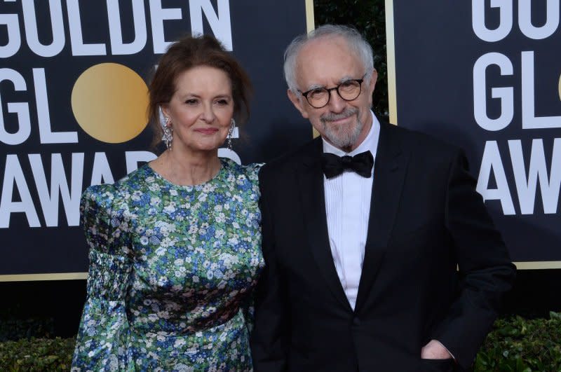 Jonathan Pryce (R) and Kate Fahy attend Golden Globe Awards in 2020. File Photo by Jim Ruymen/UPI