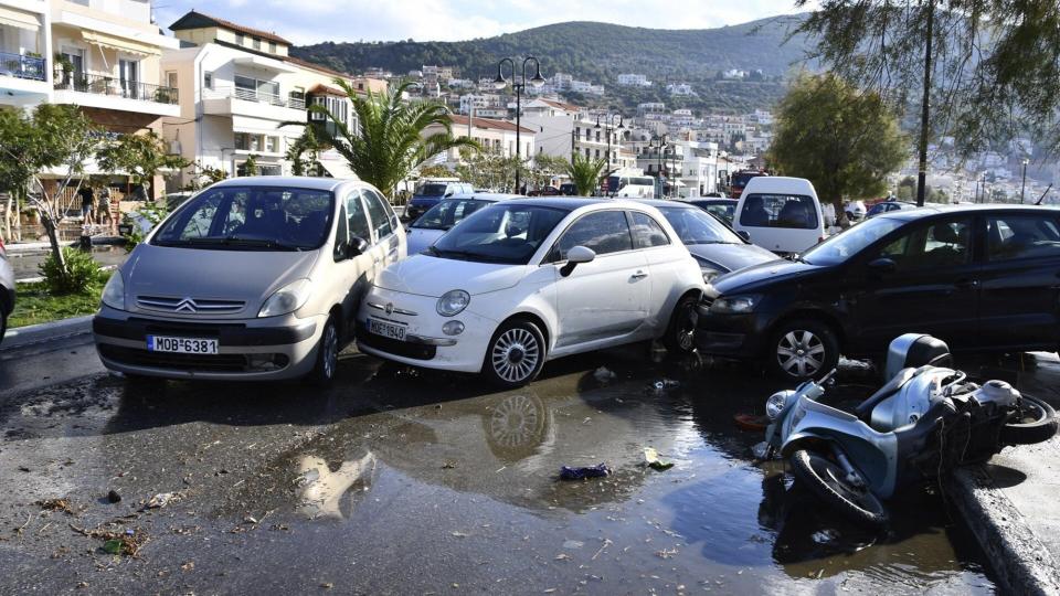 Cars are piled after an earthquake at the port of Vathi on the eastern Aegean island of Samos, Greece, Friday, Oct. 30, 2020. A strong earthquake struck in the Aegean Sea between the Turkish coast and the Greek island of Samos as the magnitude 6.6 earthquake was centered in the Aegean at a depth of 16.5 kilometers, or 10.3 miles.(AP Photo/Michael Svarnias)