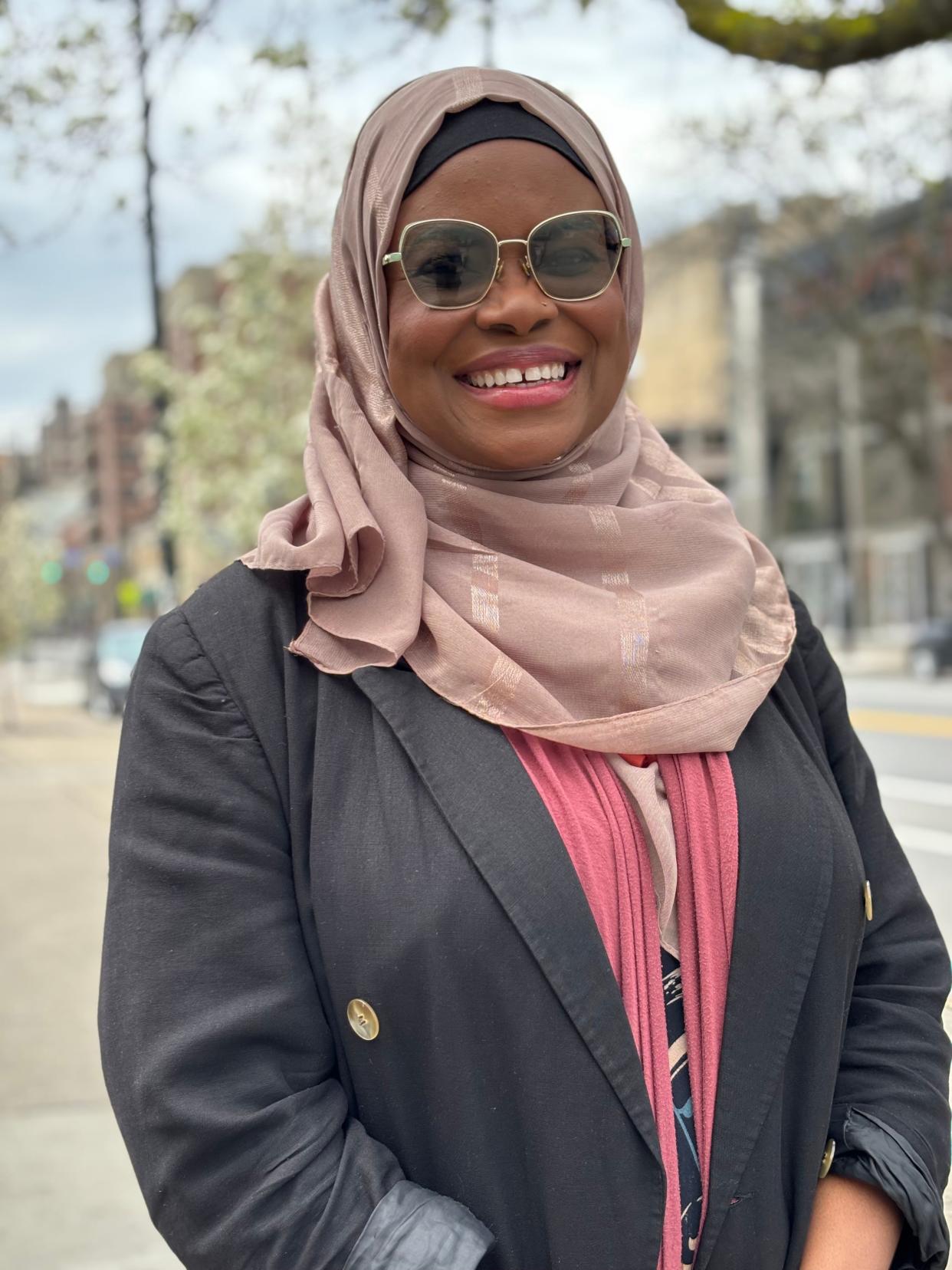 Mimi Enadeghe poses in downtown Rochester on April 23, 2024. A single mother of three, Enadeghe is heading up a new school in the fall. The Al Wadood Academy is expected to be the area’s first school aimed at Muslims for students from pre-K through 12th grade.
